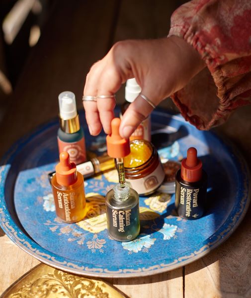 Cedar Hill Homestead natural skincare collection featuring serums, balms, and botanical oils