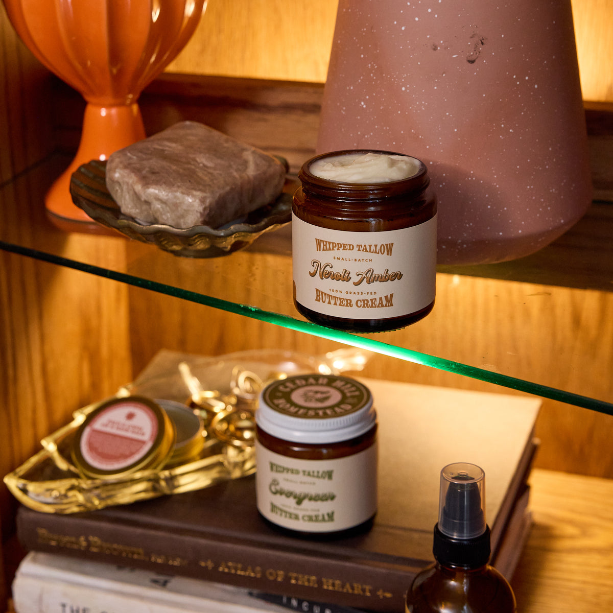 Jars of Neroli Amber and Evergreen Whipped Tallow Butter from Cedar Hill Homestead